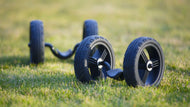 Charger l&#39;image dans la visionneuse de galerie, a pair of shifting wheels on the grass
